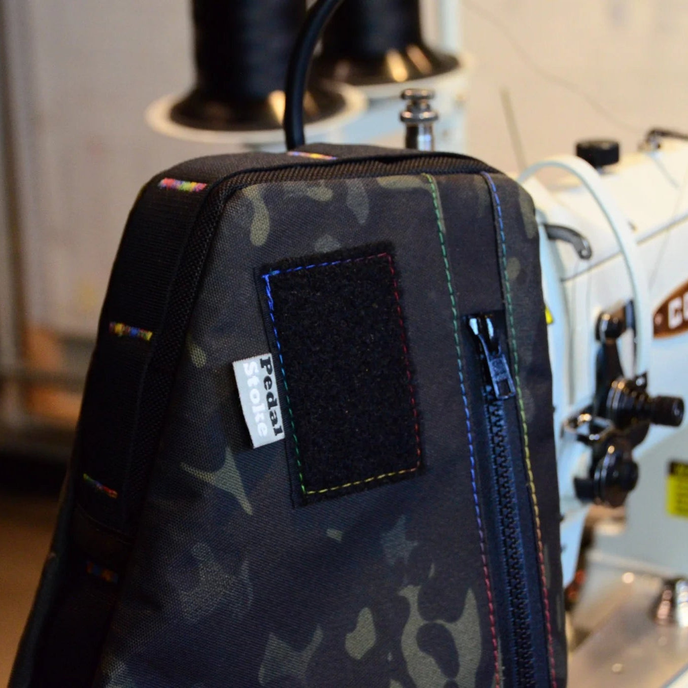 Custom Full Frame bag with clean corners, Rainbow thread and Black Multi-cam fabric